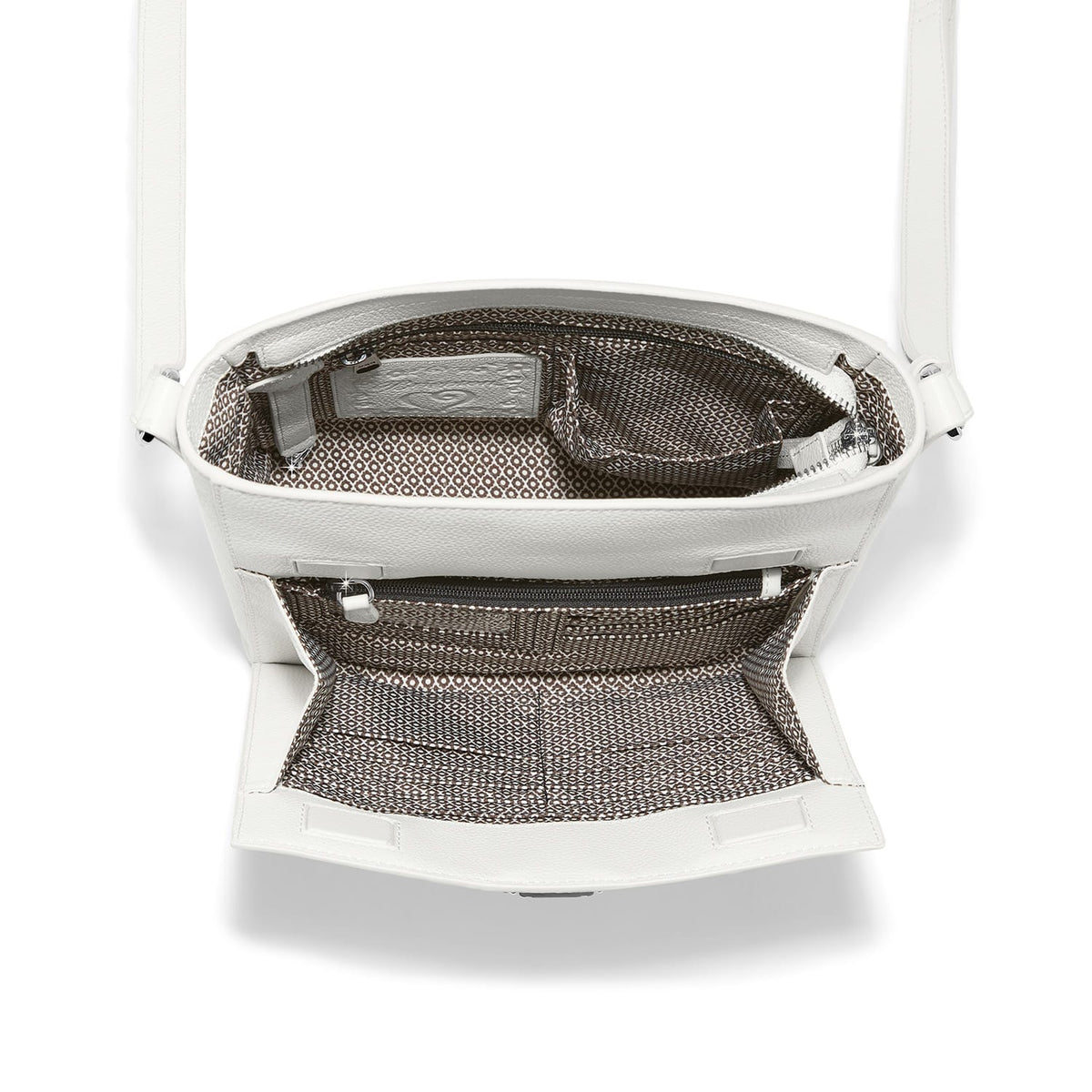 Close-up of Brighton white leather handbag interior view with patterned fabric lining and zippered pocket