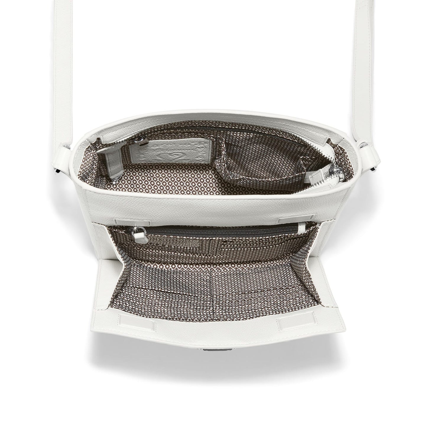 Close-up of Brighton white leather handbag interior view with patterned fabric lining and zippered pocket
