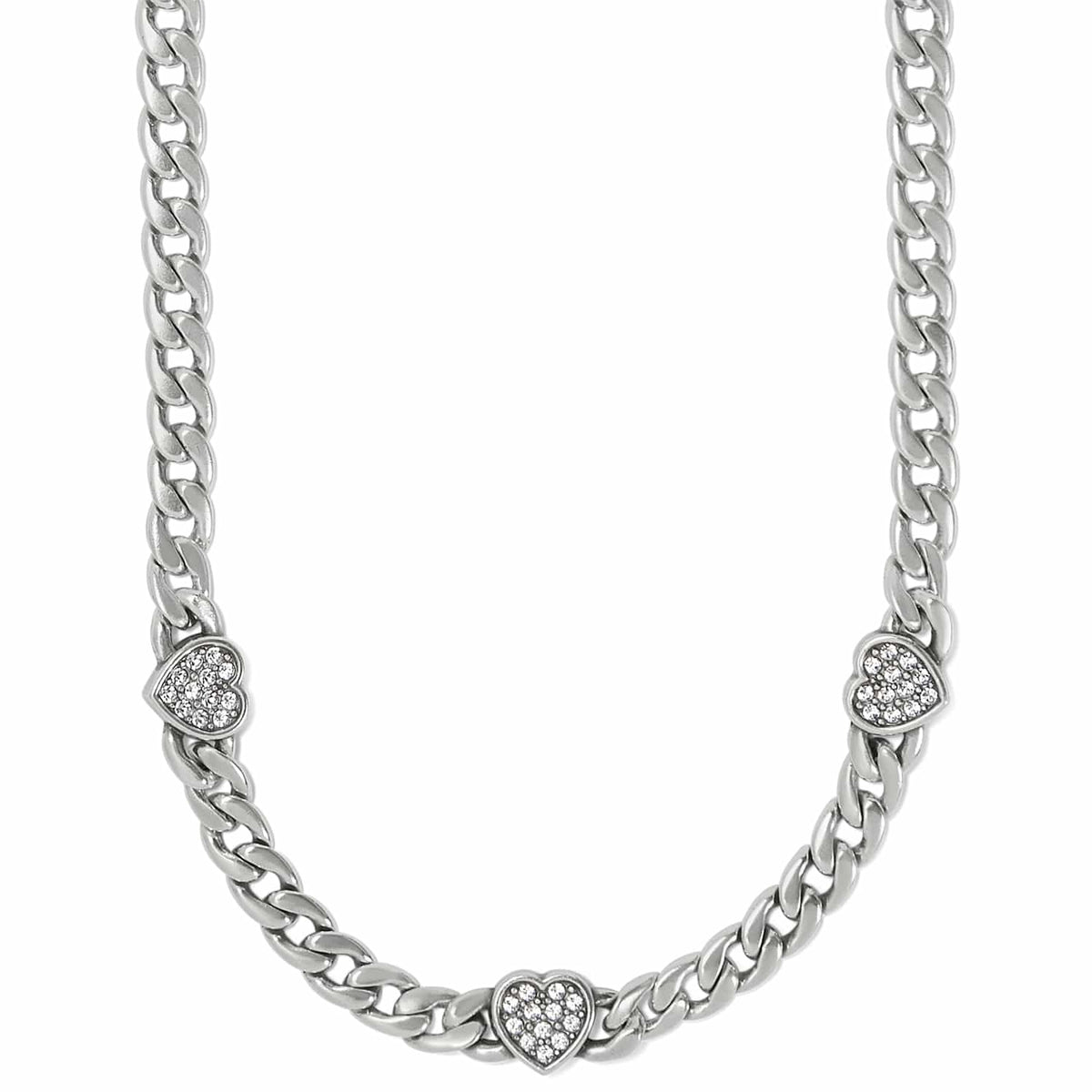 Brighton silver-plated curb chain necklace with three crystal-set heart stations on a white background
