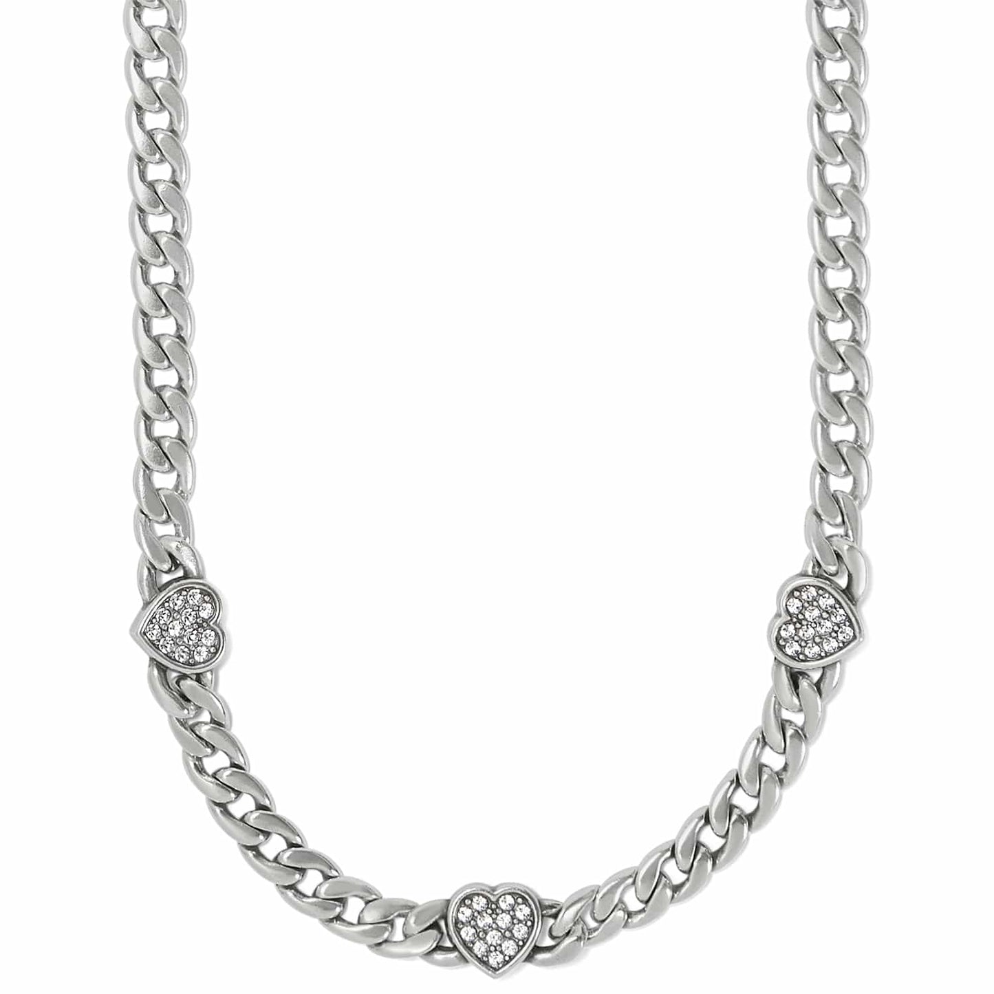 Brighton silver-plated curb chain necklace with three crystal-set heart stations on a white background