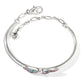 Brighton silver-plated bangle bracelet with colorful enamel wing detail and adjustable chain clasp on a white background