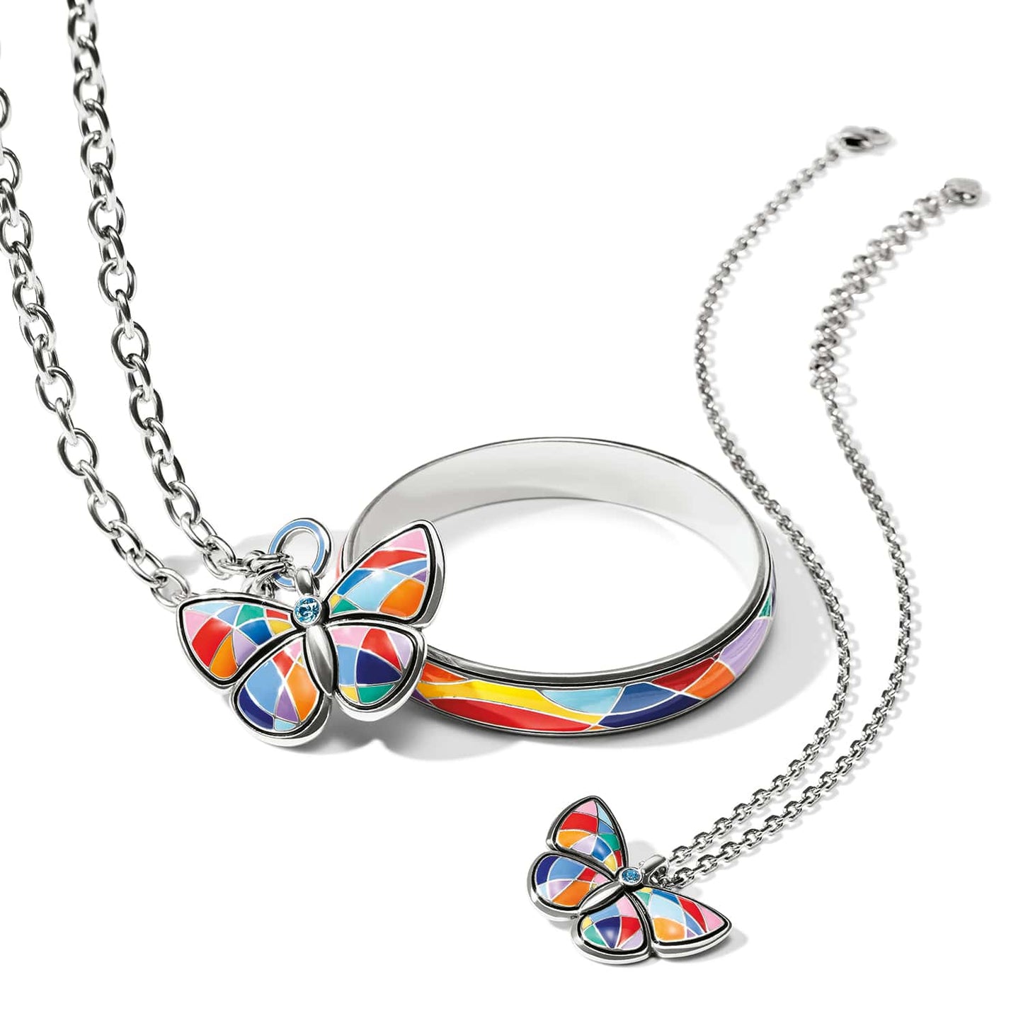 Brighton butterfly jewelry set with silver-plated bangle, necklace pendant, and matching charm featuring multicolor enamel on a white background
