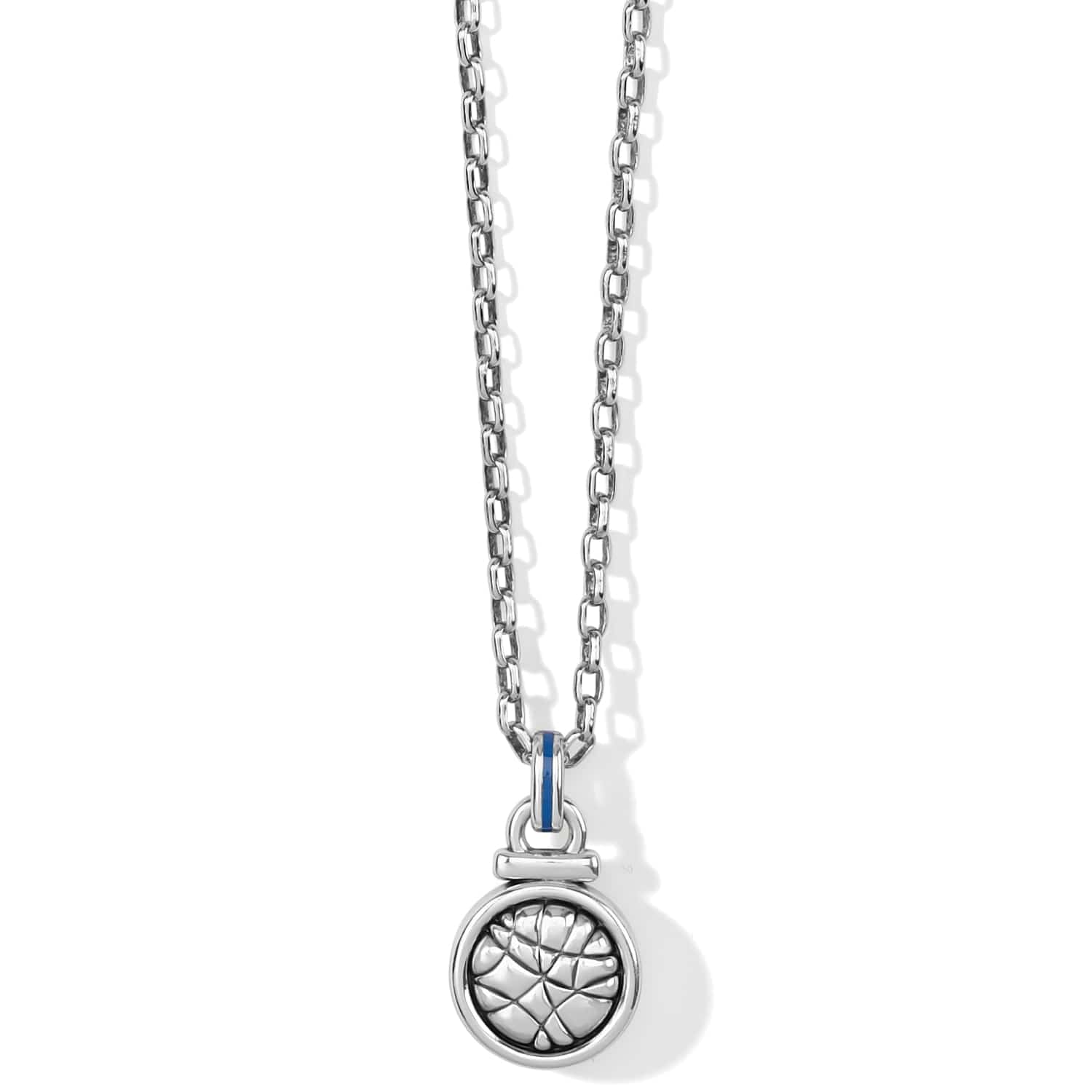 Brighton pendant necklace with silver-plated round medallion, textured center, and blue enamel bail on a white background