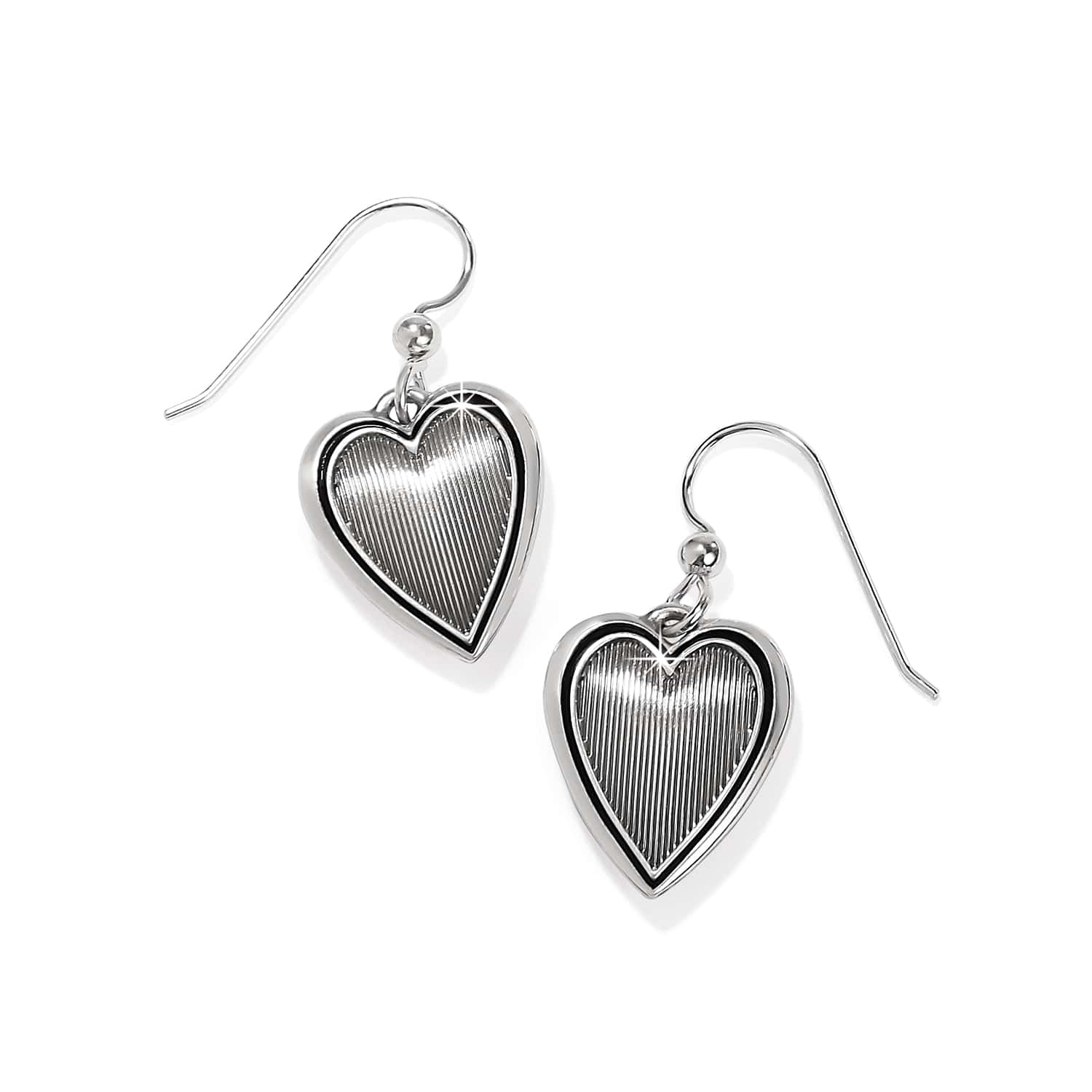 Brighton drop earrings with silver-plated heart charms featuring ridged textured centers and polished borders on a white background