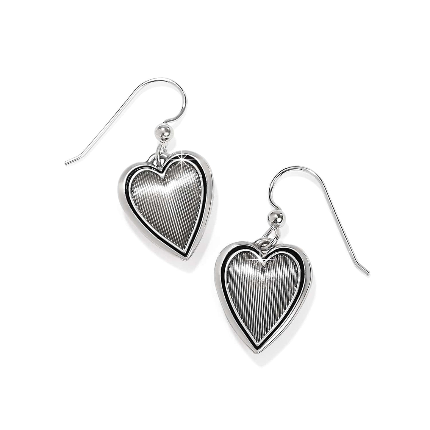 Brighton drop earrings with silver-plated heart charms featuring ridged textured centers and polished borders on a white background