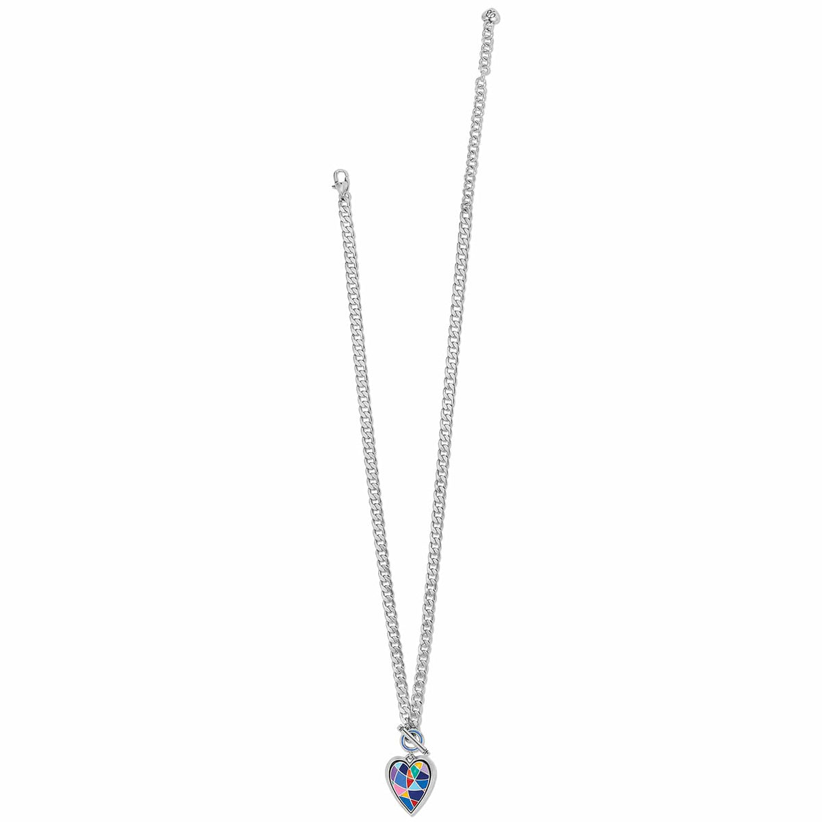 Brighton silver-plated curb chain necklace with colorful enamel mosaic heart pendant and toggle clasp on a white background