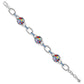 Brighton link bracelet with silver-plated oval links and three multicolor enamel mosaic discs on a white background