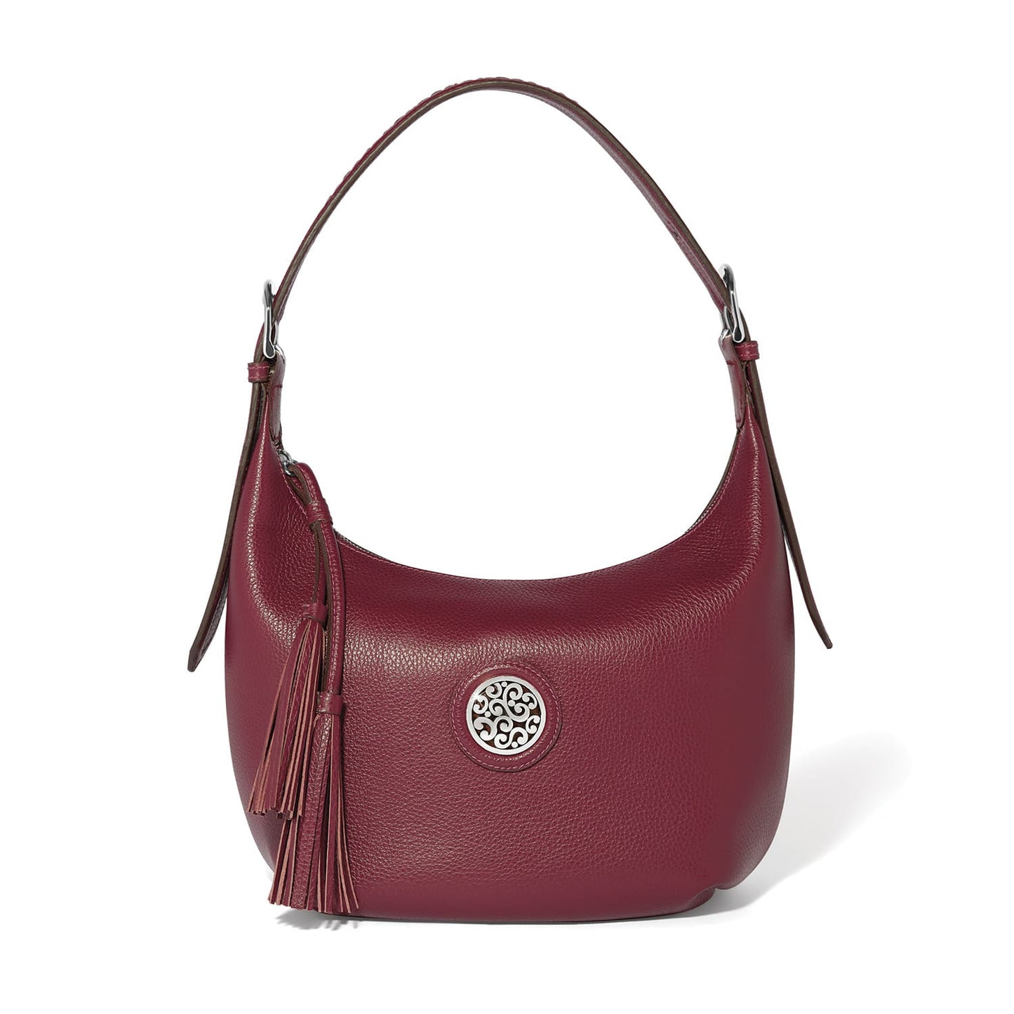 Brighton hobo handbag in burgundy pebbled leather with silver-tone medallion accent and leather tassel on a white background