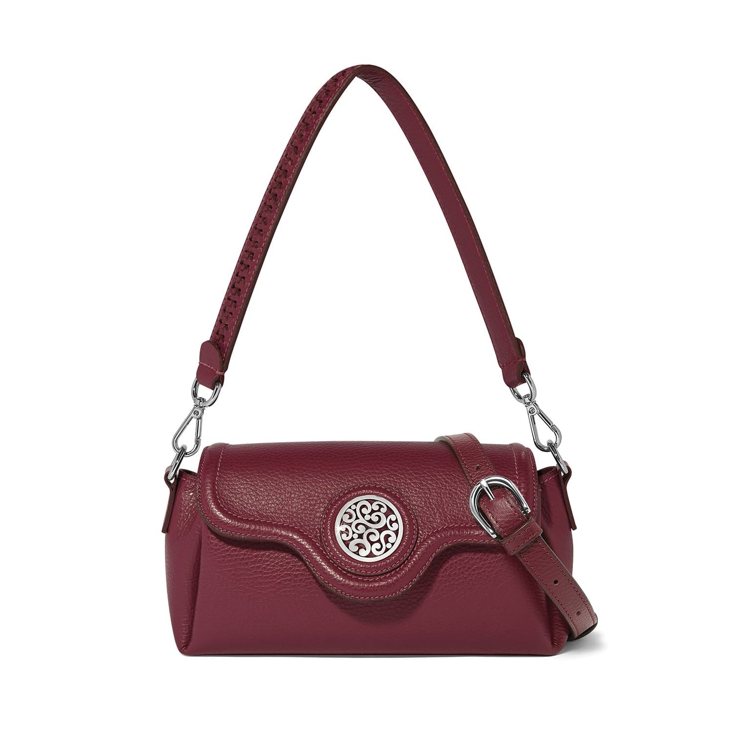 Brighton burgundy leather shoulder handbag with silver-tone medallion, buckle strap, and pebbled texture on a white background