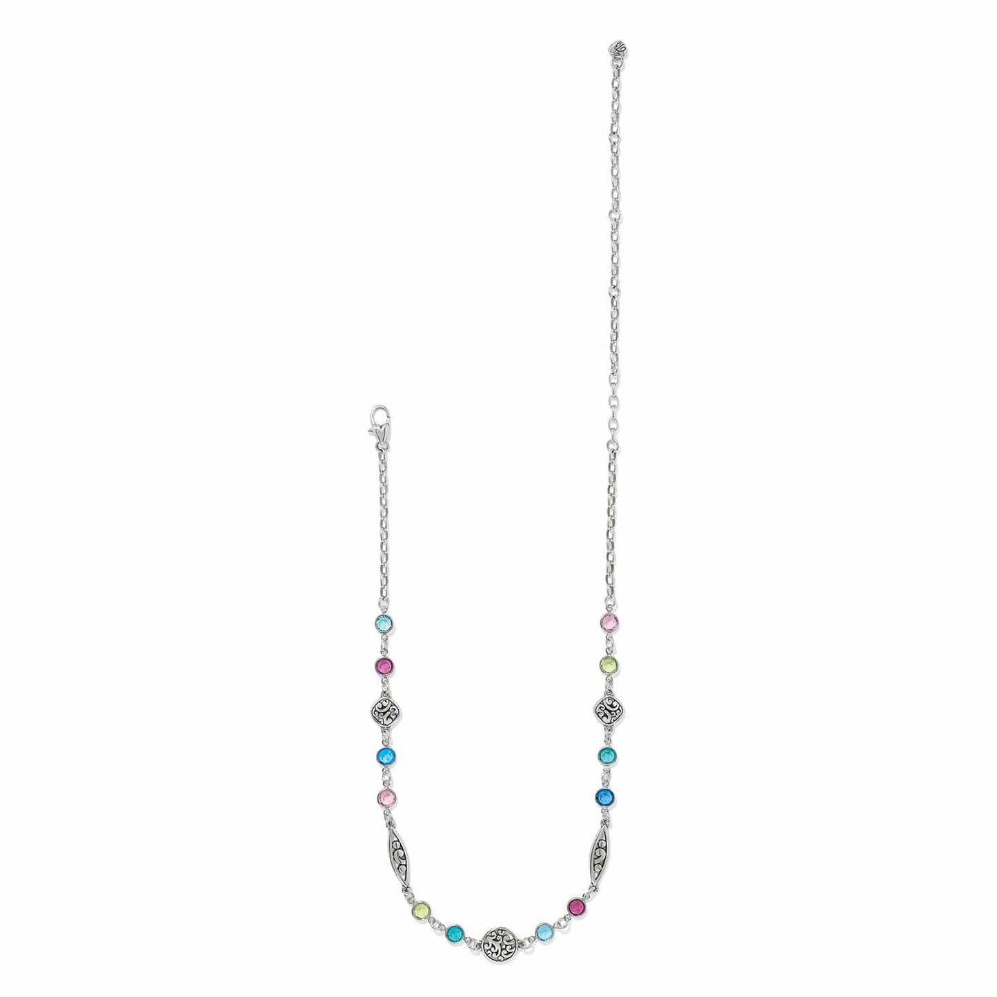 Brighton silver-plated necklace with multicolored crystal stations and ornate scroll medallions on a white background