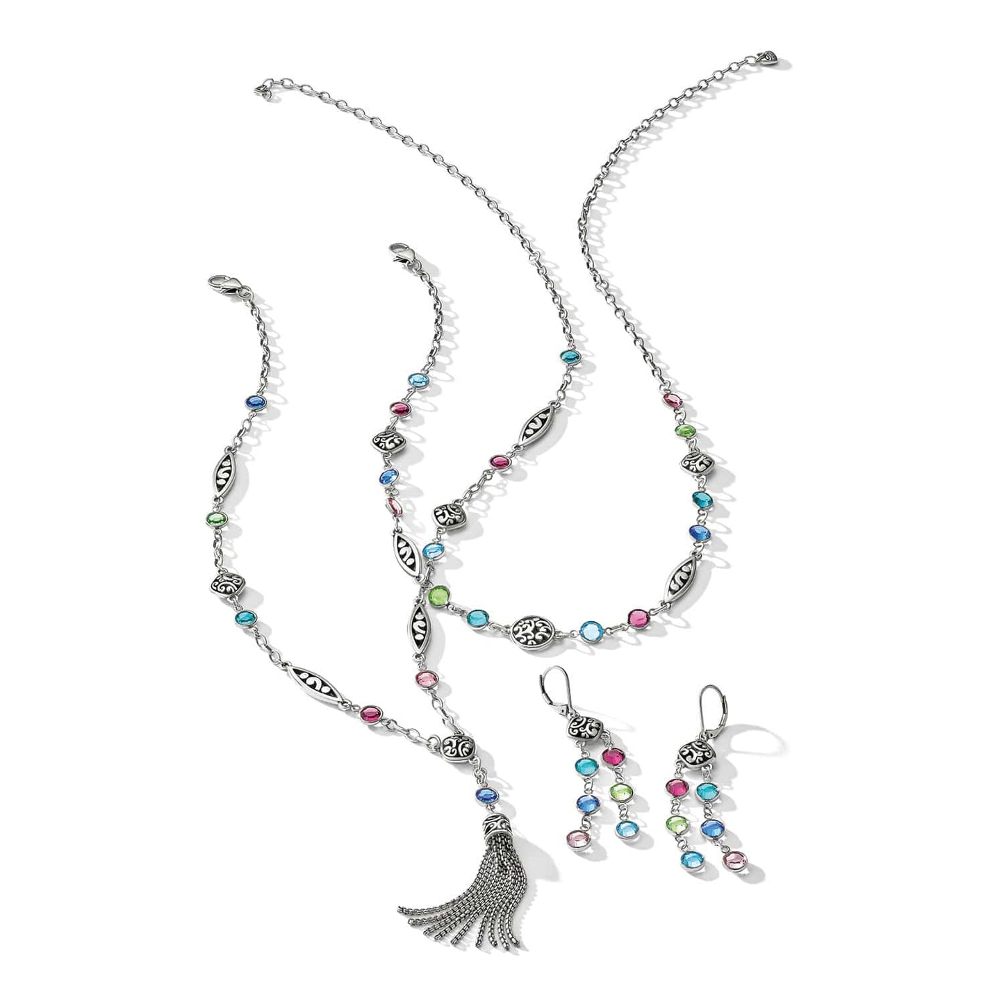 Brighton silver-plated jewelry set with multicolor crystals, tassel pendant necklace, bracelet, and drop earrings on a white background
