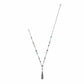Brighton silver-plated tassel necklace with multicolored crystal stations and engraved scrollwork links on a white background