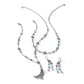 Brighton silver-plated jewelry set with necklace, bracelet, and earrings featuring multicolored crystals and tassel pendant on a white background
