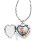 Brighton heart locket necklace shown open with silver-plated chain and photo of two children inside on a white background