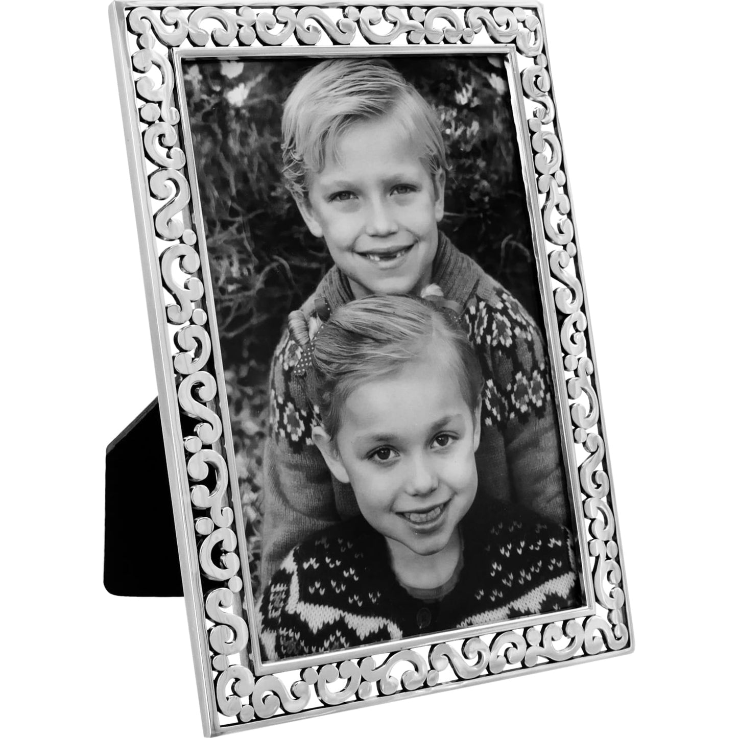Brighton silver-plated picture frame with ornate scrollwork border displaying a black and white photo on a white background