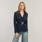 Model wearing a Brighton black leather belt with ornate silver-tone heart buckle over a navy pinstripe blazer