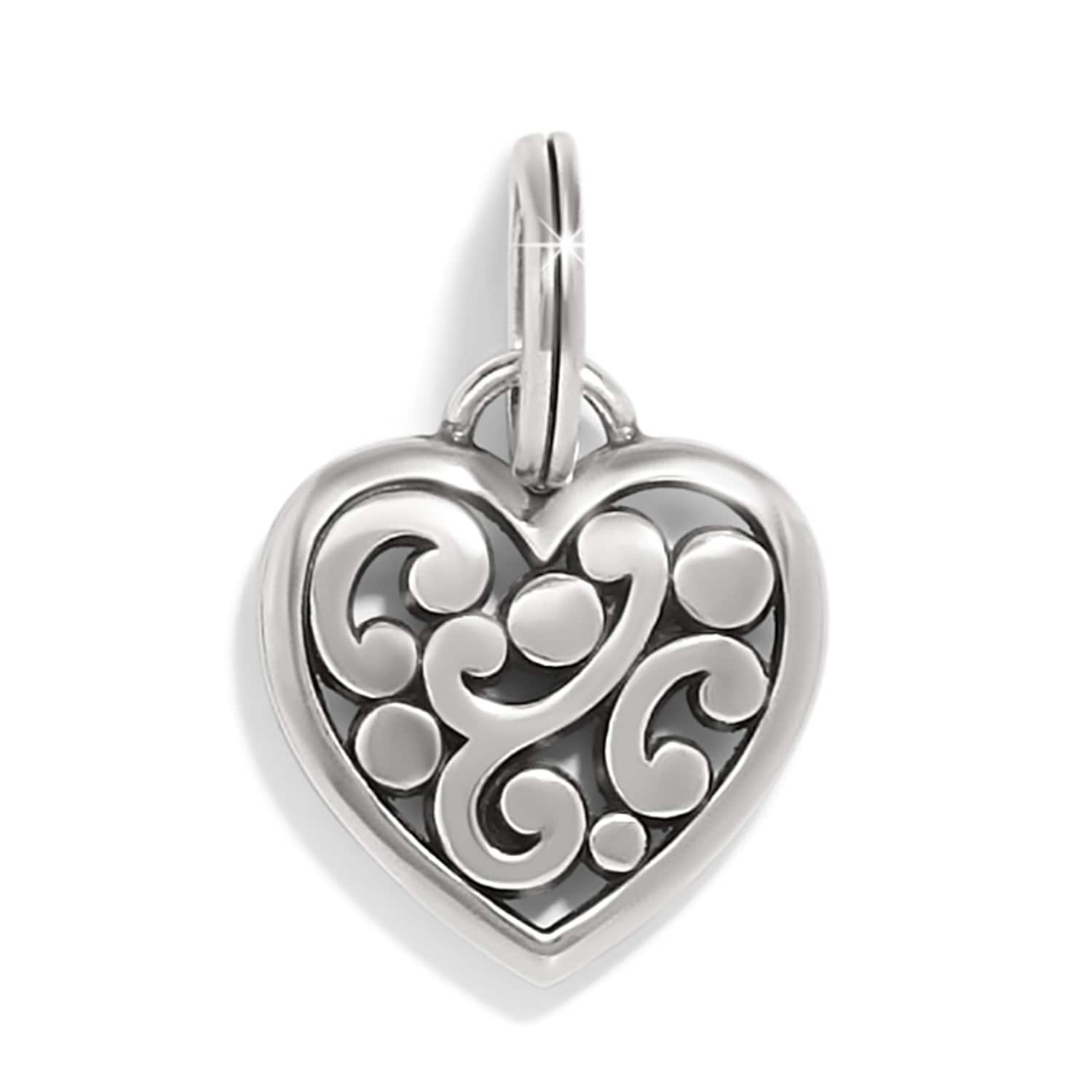 Brighton heart charm with silver-tone scroll and dot openwork design and split ring on a white background
