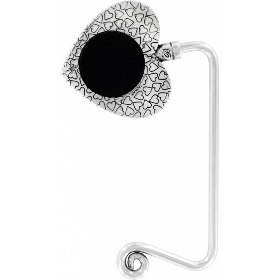 Brighton heart-shaped purse hook with black center medallion and silver-tone hearts pattern on a white background