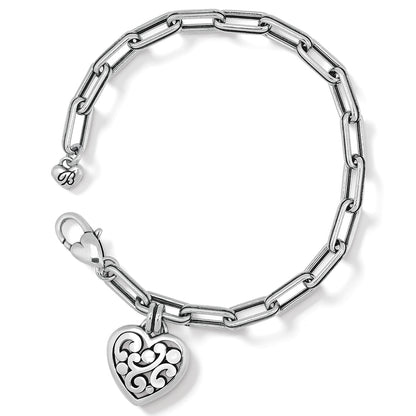 Brighton charm bracelet with silver-plated paperclip chain and scrolled heart pendant on a white background