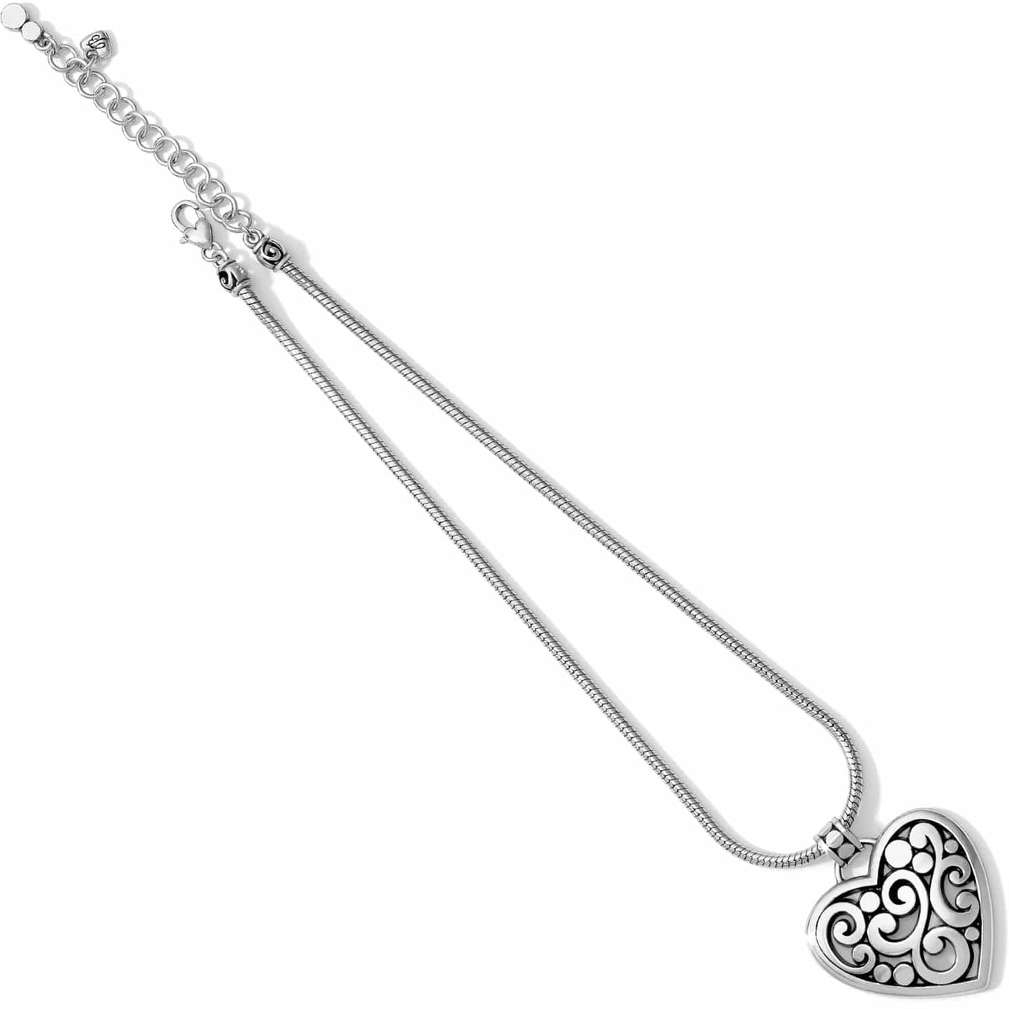 Brighton heart pendant necklace with silver-plated scroll and dot design on snake chain on a white background