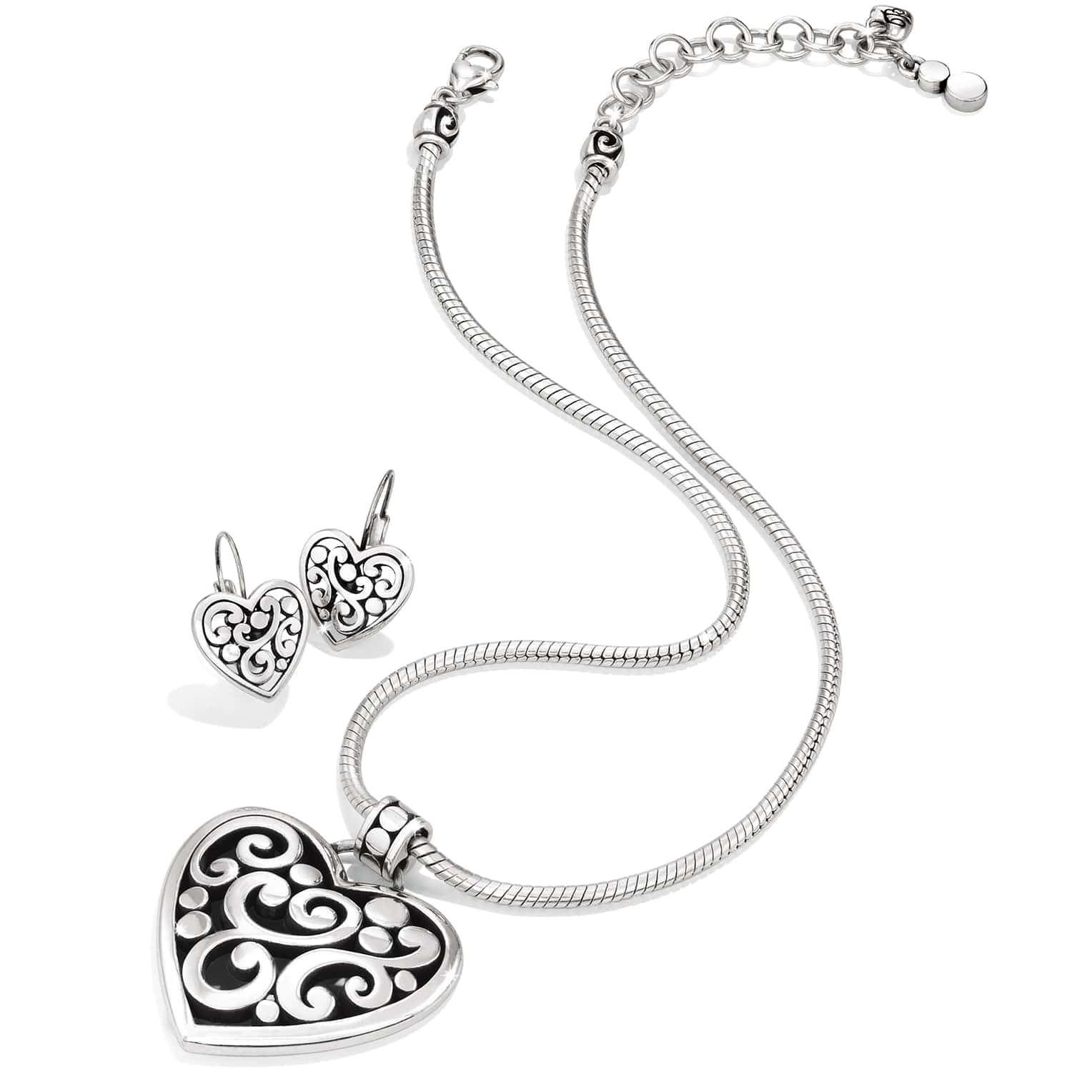 Brighton silver-plated heart pendant necklace with matching scroll-patterned drop earrings on a white background