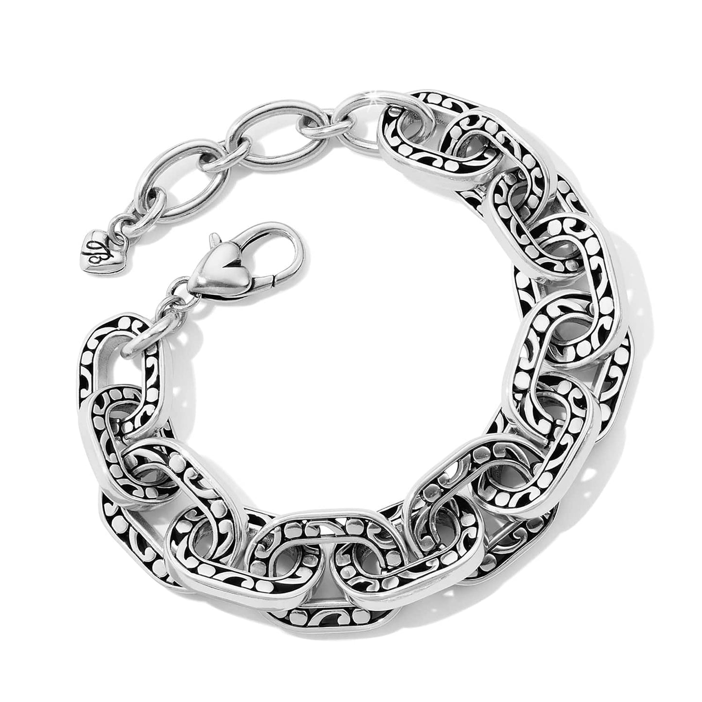 Brighton chunky link bracelet with silver-plated scrollwork and dotted openwork design and lobster clasp on a white background