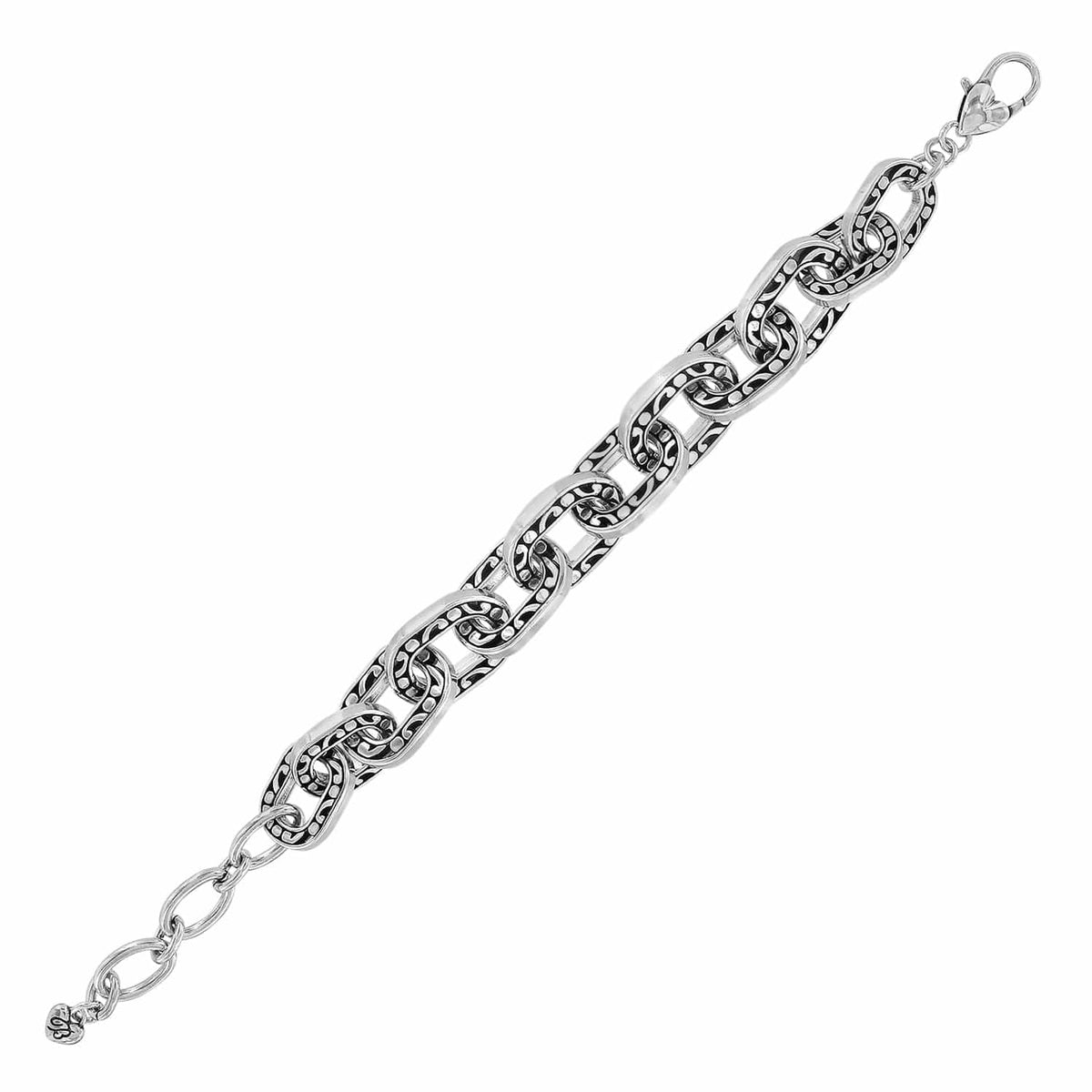 Brighton chain link bracelet with silver-plated oval links featuring engraved scroll and dot patterns on a white background