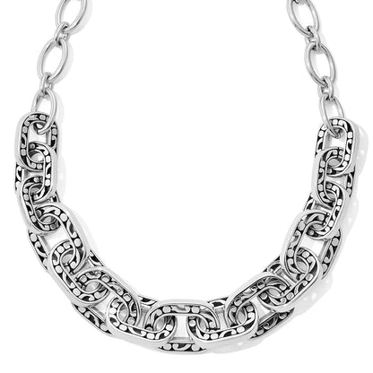 Brighton chain link necklace with silver-plated ornate scroll and dot detailing on large oval links on a white background