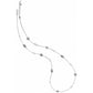 Brighton long station necklace with silver-plated oval scroll beads and round accents on a white background