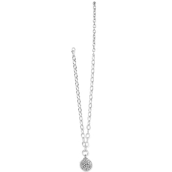 Brighton pendant necklace with silver-tone cable chain and round scroll-patterned medallion charm on a white background