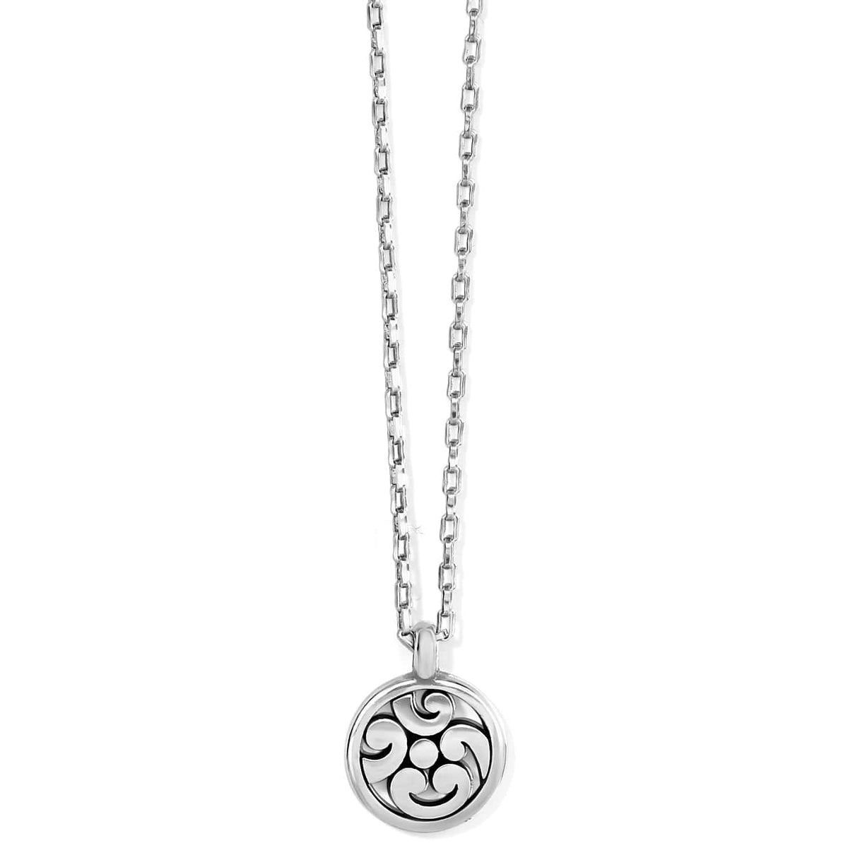 Brighton pendant necklace with round silver-tone medallion featuring openwork scroll design and box chain on a white background