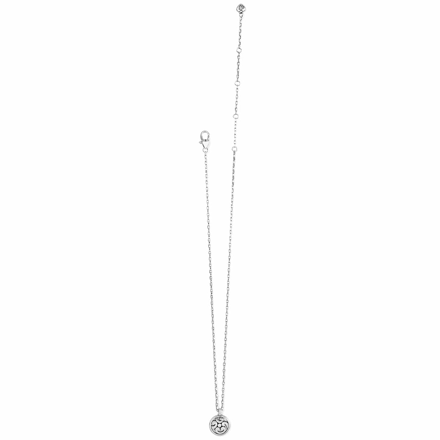 Brighton pendant necklace with small round silver-tone scrollwork medallion and delicate chain on a white background