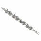 Brighton bracelet with silver-plated swirling scroll links and folding clasp closure on a white background