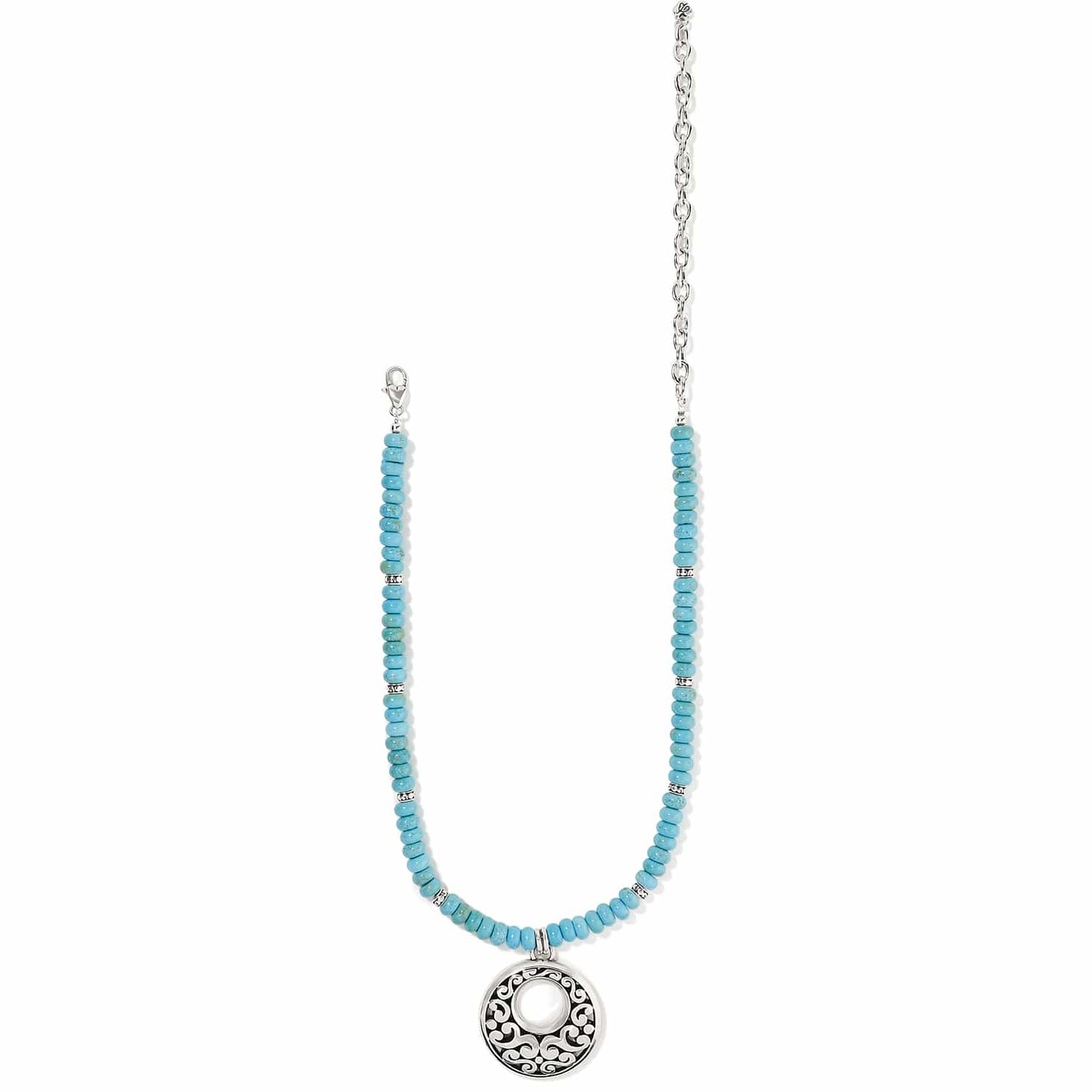 Brighton beaded necklace with turquoise dyed howlite beads, silver-plated scroll pendant, and chain on a white background
