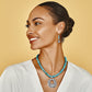 Model wearing a Brighton dyed howlite beaded necklace with silver-plated openwork circle pendant paired with matching drop earrings