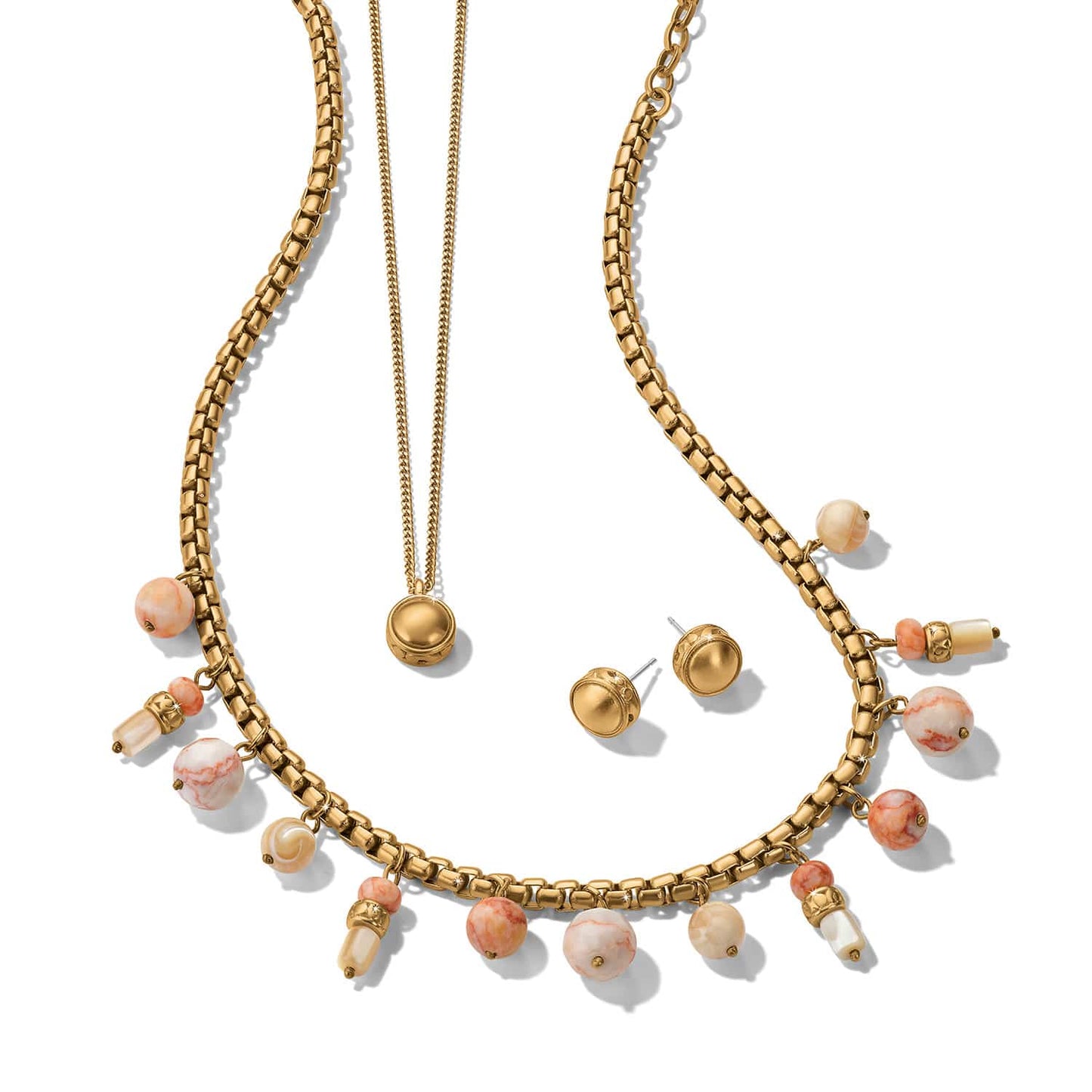 Brighton gold-plated layered necklace and stud earrings set with peach and cream marbled beads on a white background