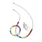 Brighton silver-plated necklace styled with multicolor beaded bracelets and hoop earrings on a white background