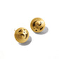 Brighton stud earrings with gold-plated dome design and engraved scroll swirl motif on a white background