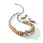 Brighton necklace with cream disk beads and silver-plated ornate bead, styled with matching earrings on white background