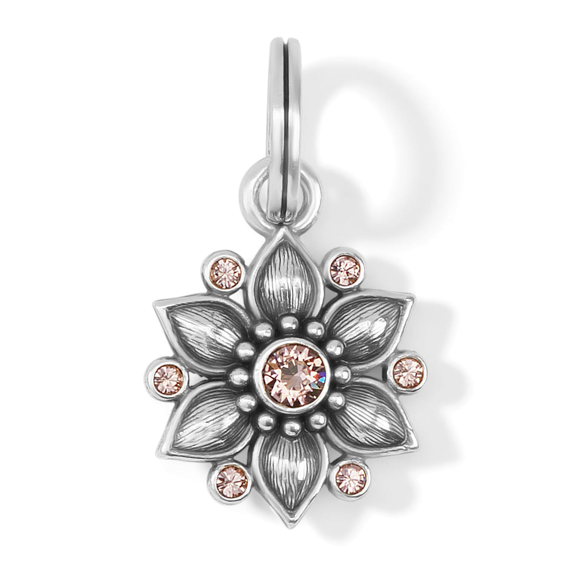 Brighton flower charm with silver-plated petals and pink crystal accents surrounding a central stone on a white background