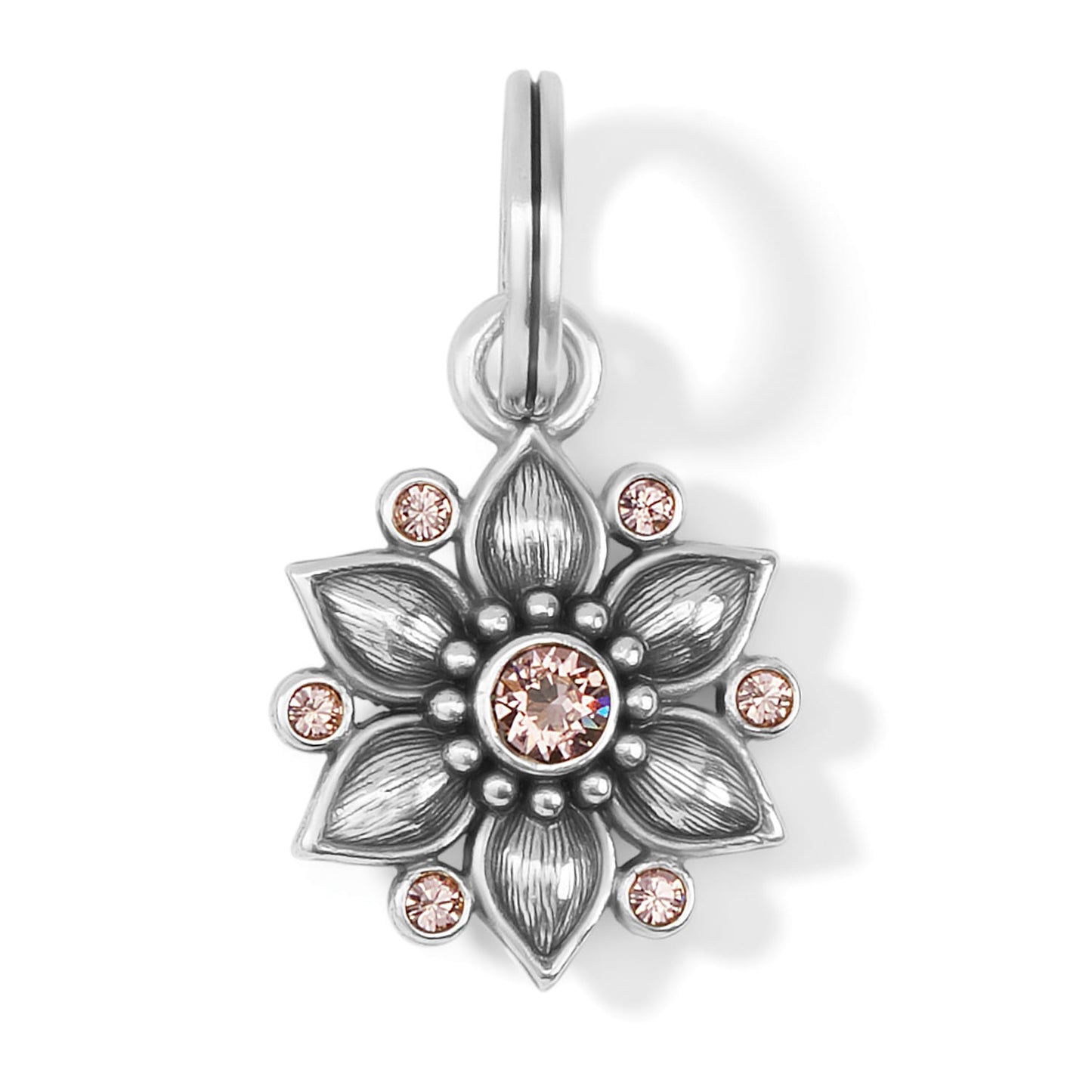 Brighton flower charm with silver-plated petals and pink crystal accents surrounding a central stone on a white background