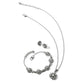 Brighton silver-plated floral jewelry set with necklace, bracelet, and stud earrings featuring crystal accents on white