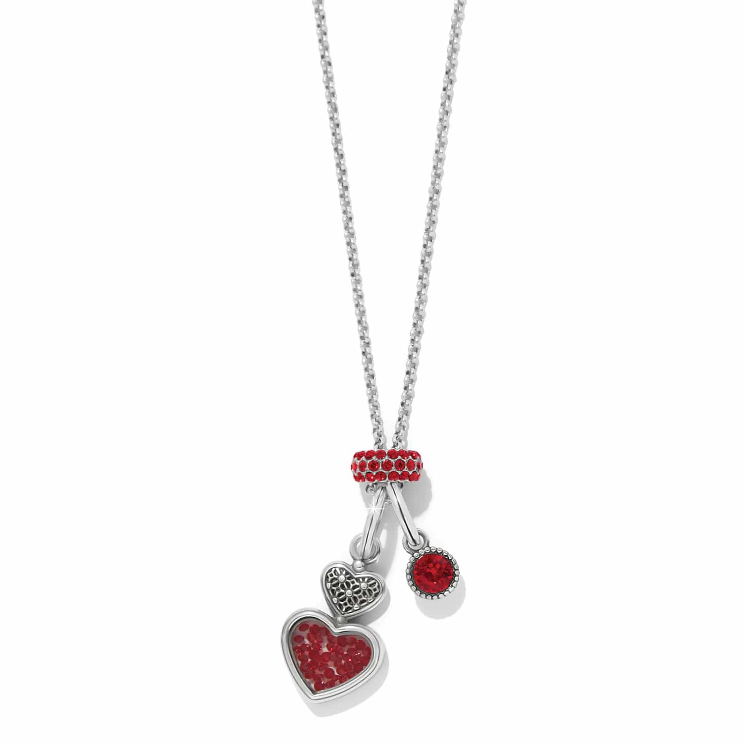 Brighton charm necklace with silver-plated heart charms and red crystal accents on a white background