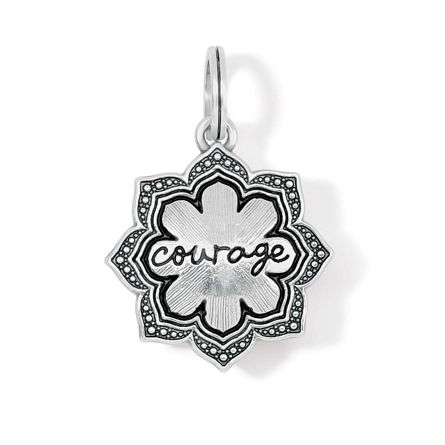 Brighton charm with silver-plated lotus flower design and engraved courage script in center on a white background