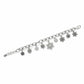 Brighton silver-plated charm bracelet with assorted snowflake charms and crystal accents on a white background