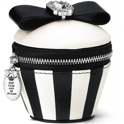 Brighton cupcake-shaped coin purse with black and white stripes, satin bow, crystal accent, and engraved charm on a white background