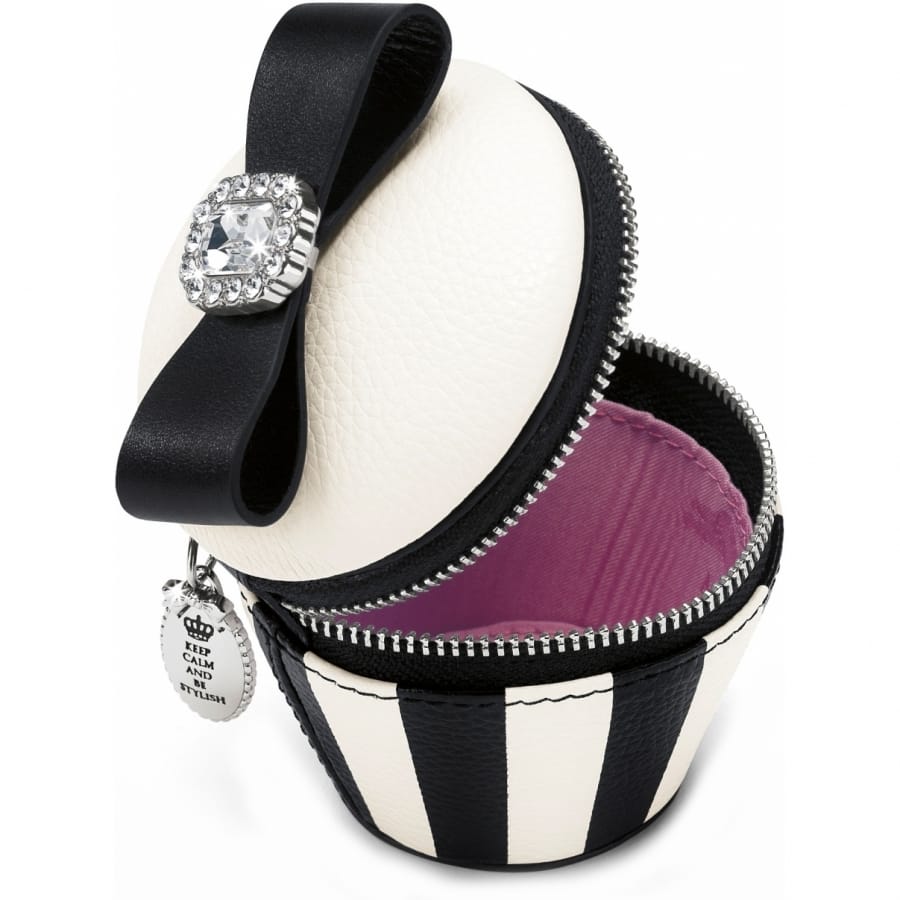 Brighton cupcake-shaped trinket case shown open with black bow, crystal accent, pink lining, and zipper closure on a white background