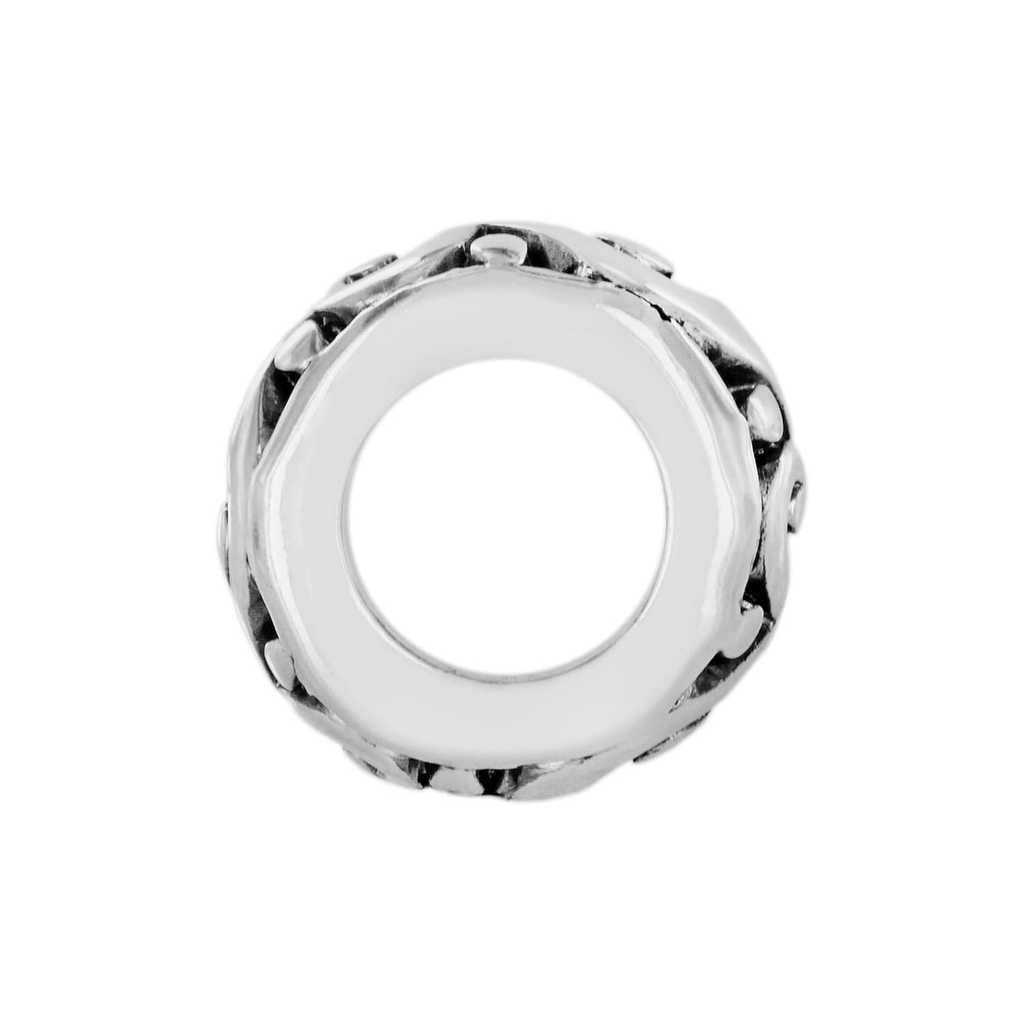 Brighton silver-plated spacer charm shown from the front with textured openwork design and round center opening on a white background