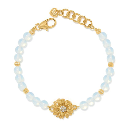 Brighton beaded bracelet with opalescent beads, gold-plated flower centerpiece with crystals, and lobster clasp on a white background
