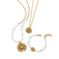 Brighton gold-plated daisy necklaces and bracelet with crystal centers and opalescent beaded accents on a white background